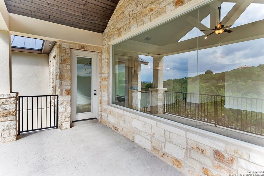 Exterior details and patio area of a home in , Blanco (Image 14).