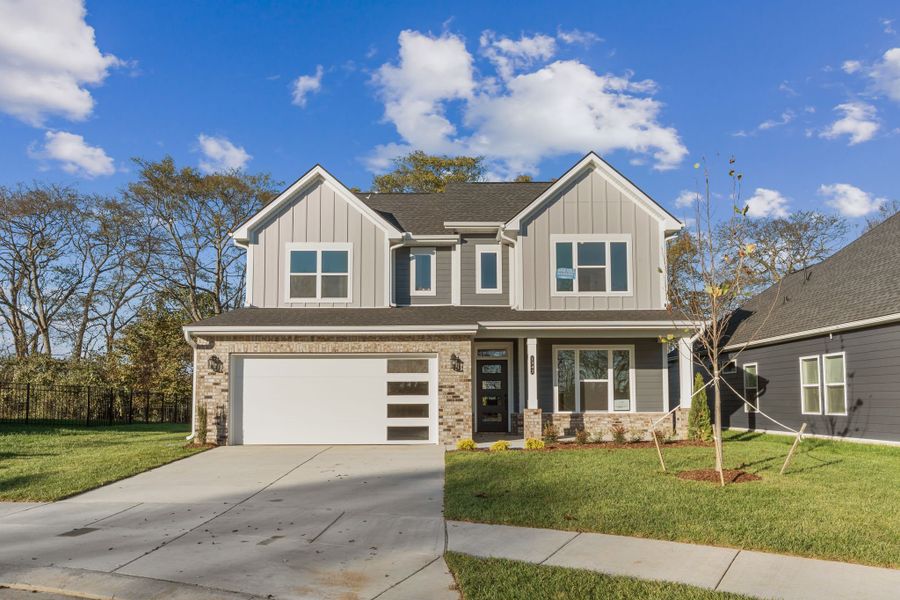 Front exterior of a new home in Nexus – Village Collection, Gallatin, TN, highlighting curb appeal (Image 20).