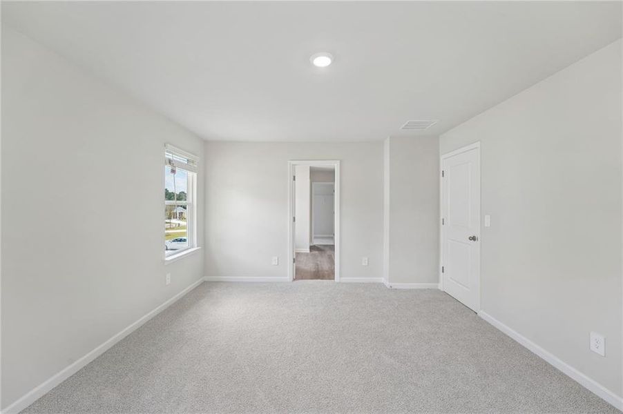 Spacious, unfurnished interior of a new home in Northwoods at Mirror Lake, Villa Rica (Image 42).