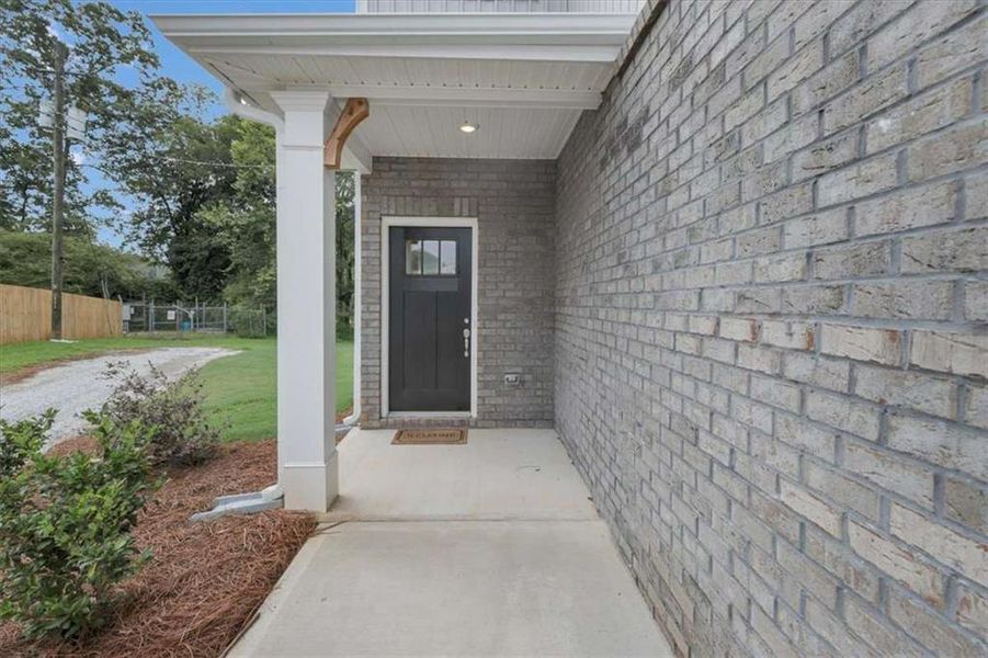 Exterior details and patio area of a home in Scarlett Place, Bowdon (Image 3).