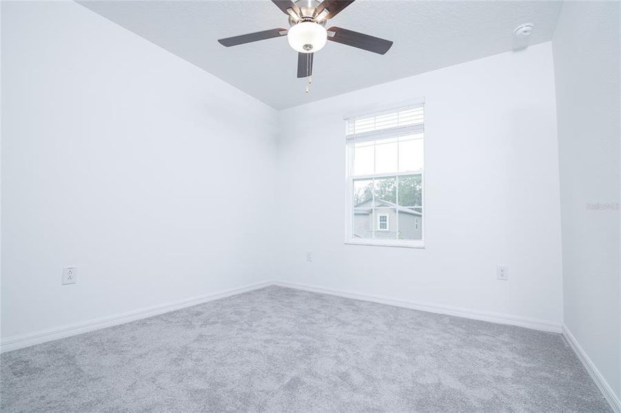 Spacious, unfurnished interior of a new home in Saddle Creek Preserve: The Manors II, Lakeland (Image 23).