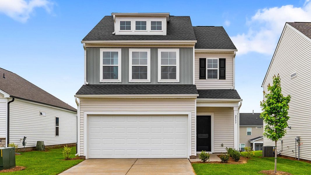 Front exterior of a new home in Central Creek, Goose Creek, SC, highlighting curb appeal (Image 1).