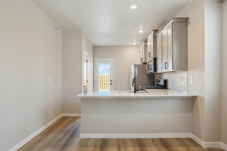 Furnished interior view inside a new home in Second Creek Farm, Commerce City (Image 6).
