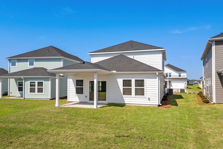 Exterior details and patio area of a home in Waterside - Boardwalk Series, Longs (Image 3).