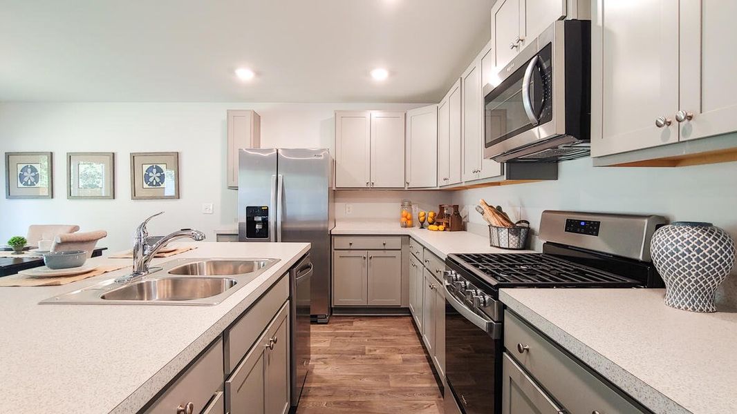 Furnished interior view inside a new home in Garbon Fields, Summerville (Image 15).