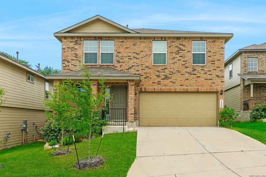 Front exterior of a new home in Copper Canyon, Bulverde, TX, highlighting curb appeal (Image 16).