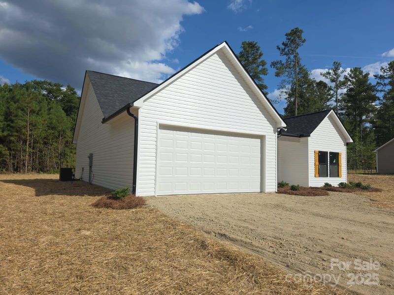 Front exterior of a new home in , Pageland, SC, highlighting curb appeal (Image 12).