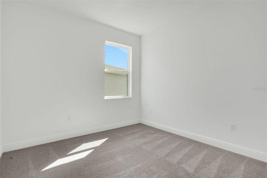 Spacious, unfurnished interior of a new home in Reserve at Hammock Oaks, Lady Lake (Image 15).