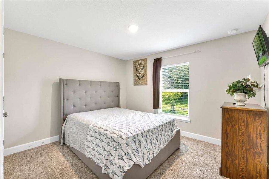 Furnished interior view inside a new home in Poinciana Enclave, Kissimmee (Image 3).
