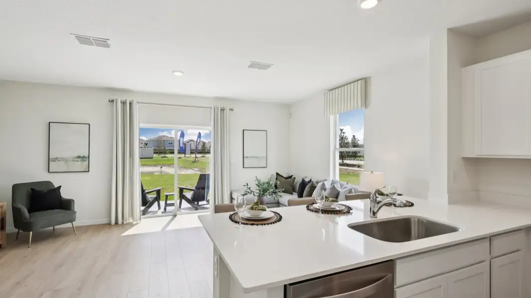 Furnished interior view inside a new home in Towns at Woodsdale, Wesley Chapel (Image 14).
