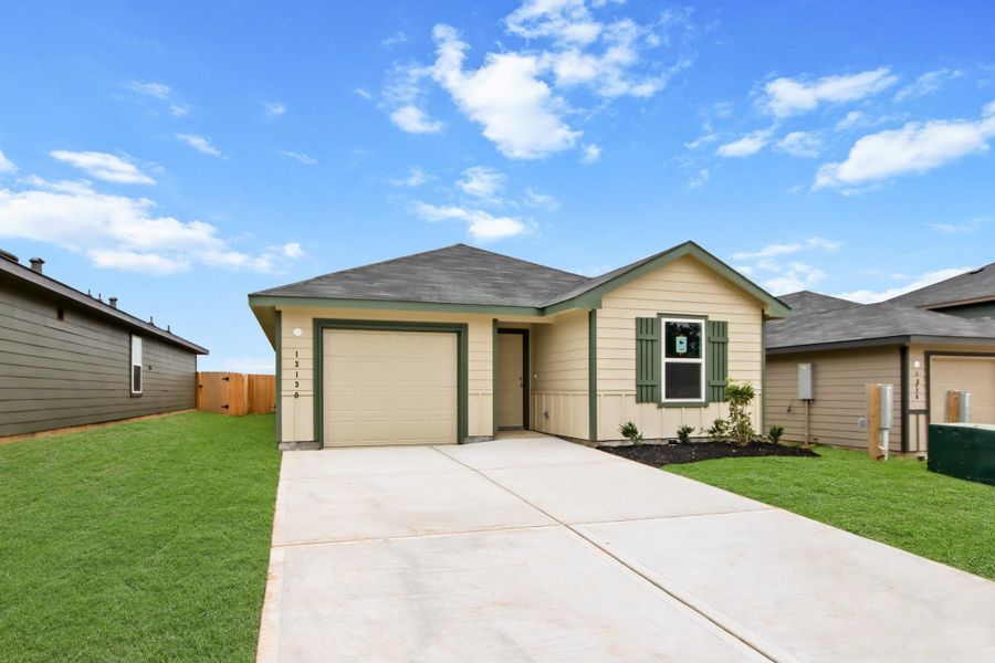 Front exterior of a new home in McCrorey Trails, Conroe, TX, highlighting curb appeal (Image 2). Front exterior of a new home in McCrorey Trails, Conroe, TX, highlighting curb appeal (Image 2).
