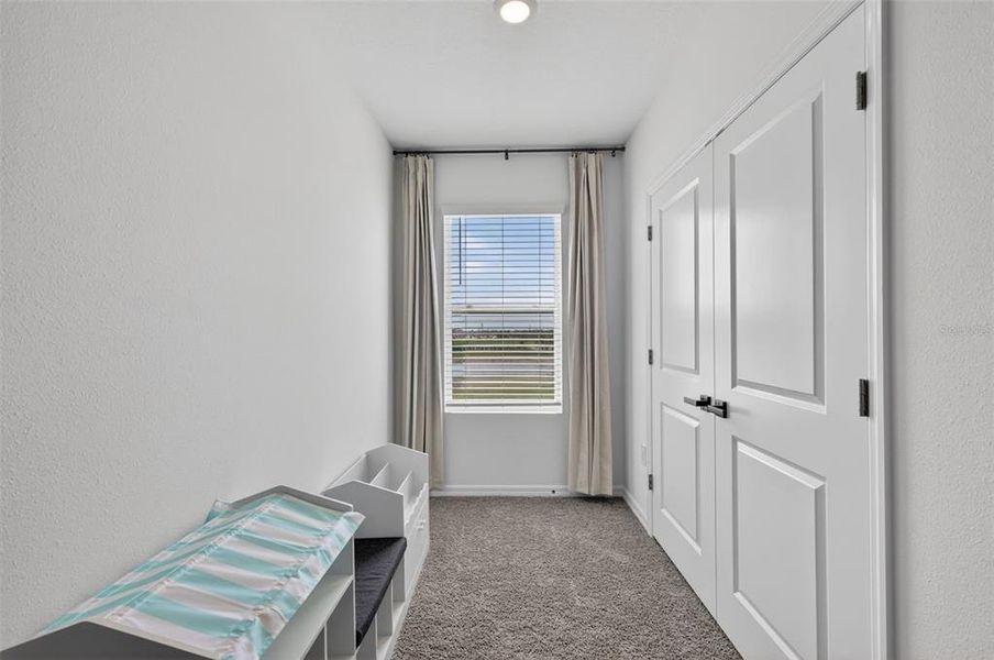 Furnished interior view inside a new home in Mangrove Point, Apollo Beach (Image 13).