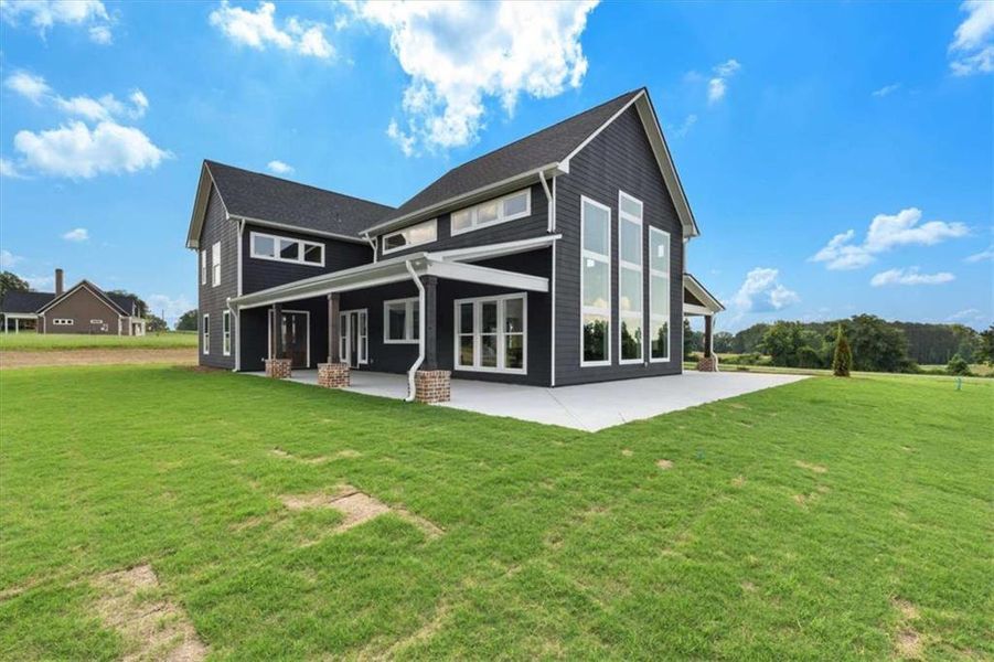 Exterior details and patio area of a home in , Roopville (Image 37).