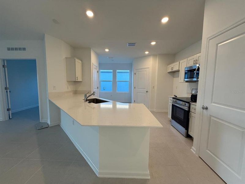 Furnished interior view inside a new home in , Kissimmee (Image 16).
