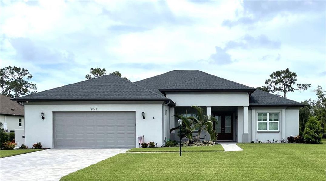 Front exterior of a new home in , Parrish, FL, highlighting curb appeal (Image 1). Front exterior of a new home in , Parrish, FL, highlighting curb appeal (Image 1).