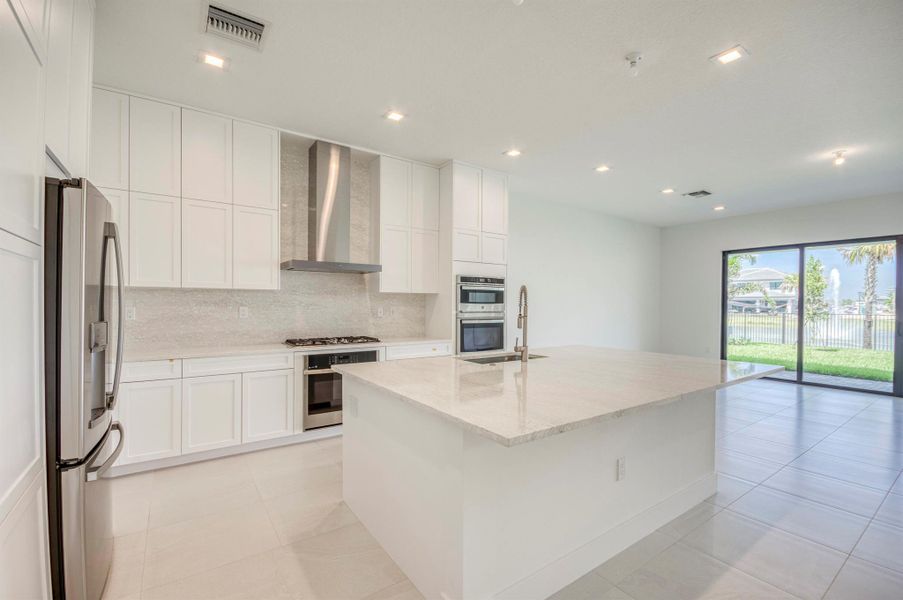 Furnished interior view inside a new home in Apex at Avenir, Palm Beach Gardens (Image 16). Furnished interior view inside a new home in Apex at Avenir, Palm Beach Gardens (Image 16).