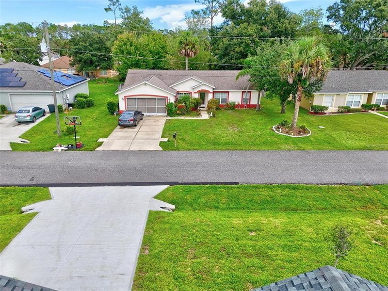 Front exterior of a new home in , Palm Coast, FL, highlighting curb appeal (Image 36).