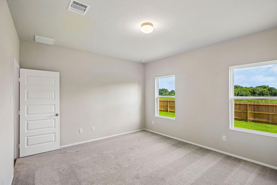 Enjoy a seamless flow between the primary bedroom and attached bathroom. Enjoy a seamless flow between the primary bedroom and attached bathroom.