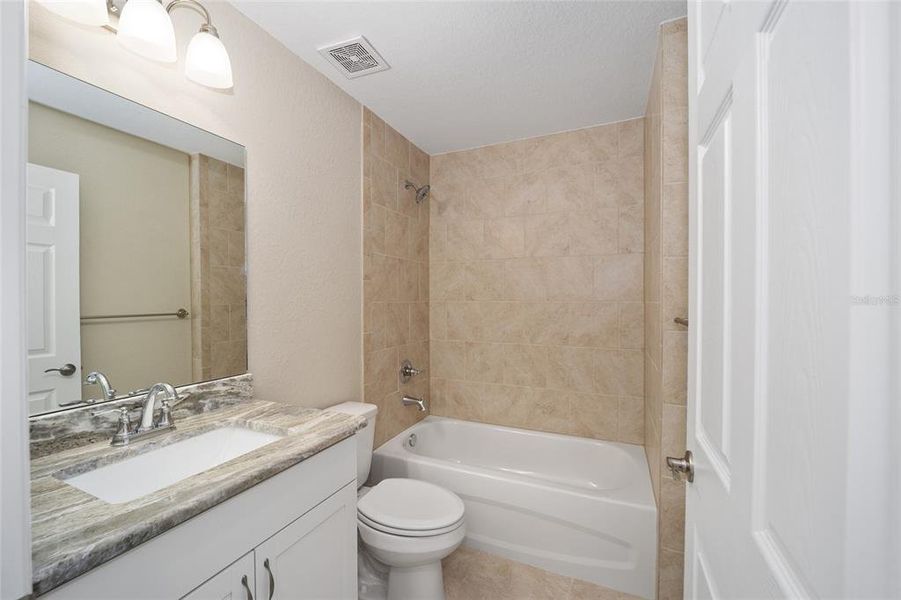 Furnished interior view inside a new home in , Dunnellon (Image 11).