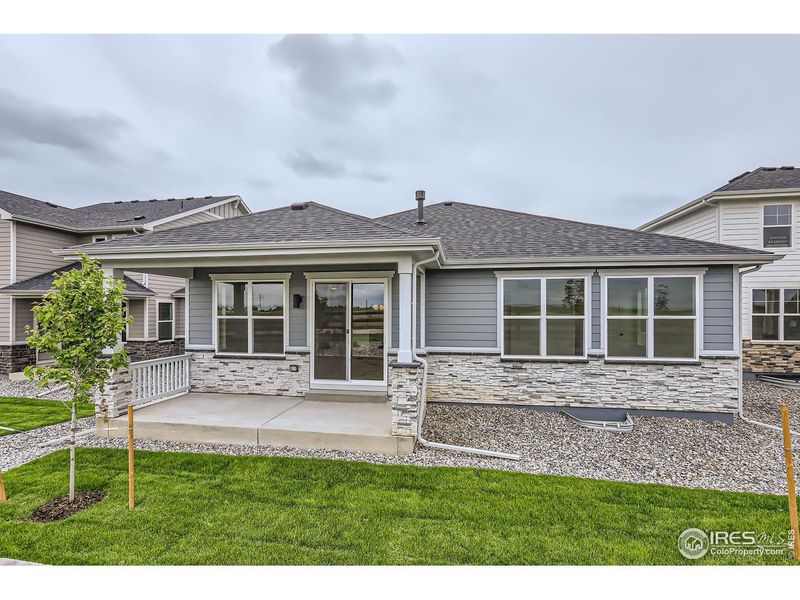 Exterior details and patio area of a home in Barefoot Lakes, Longmont (Image 20).