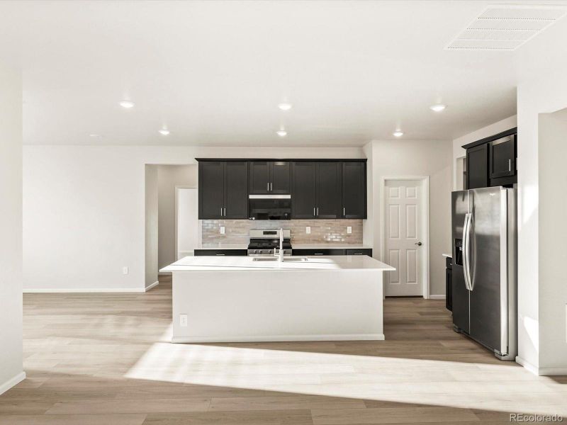 Furnished interior view inside a new home in Poudre Heights: The Alpine Collection, Windsor (Image 9). Furnished interior view inside a new home in Poudre Heights: The Alpine Collection, Windsor (Image 9).