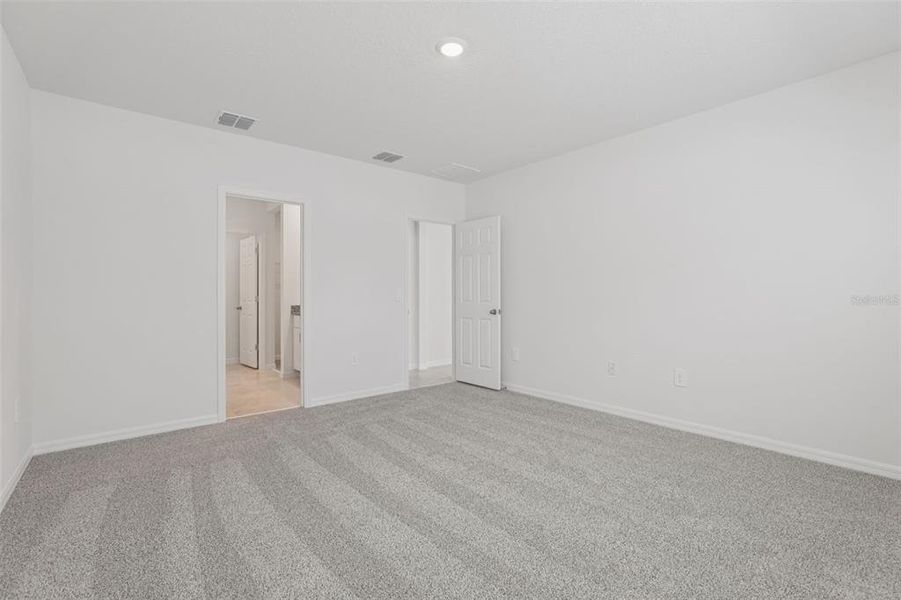 Spacious, unfurnished interior of a new home in Deer Run at Crosswinds, Davenport (Image 40).