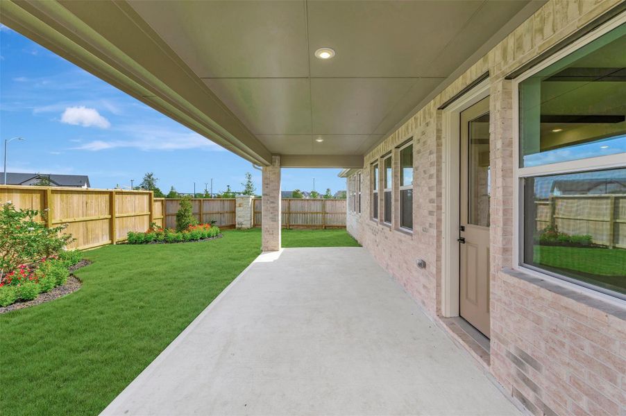 Relax outdoors on the covered patio Relax outdoors on the covered patio