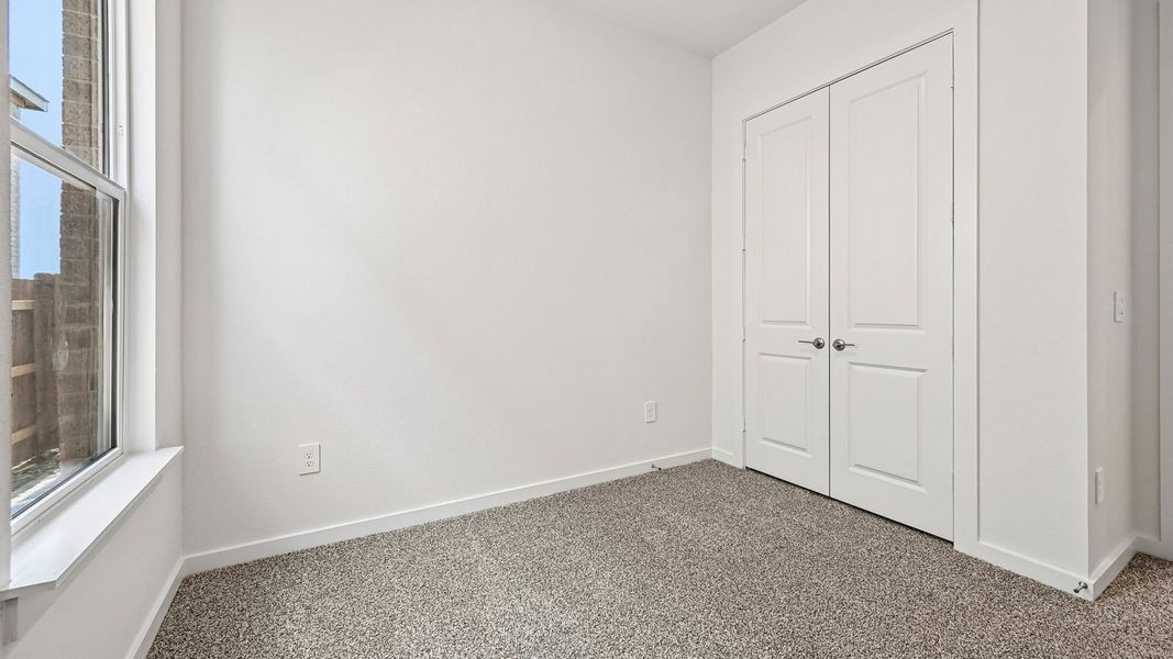 Spacious, unfurnished interior of a new home in The Enclave at Bar W Ranch, Leander (Image 38).