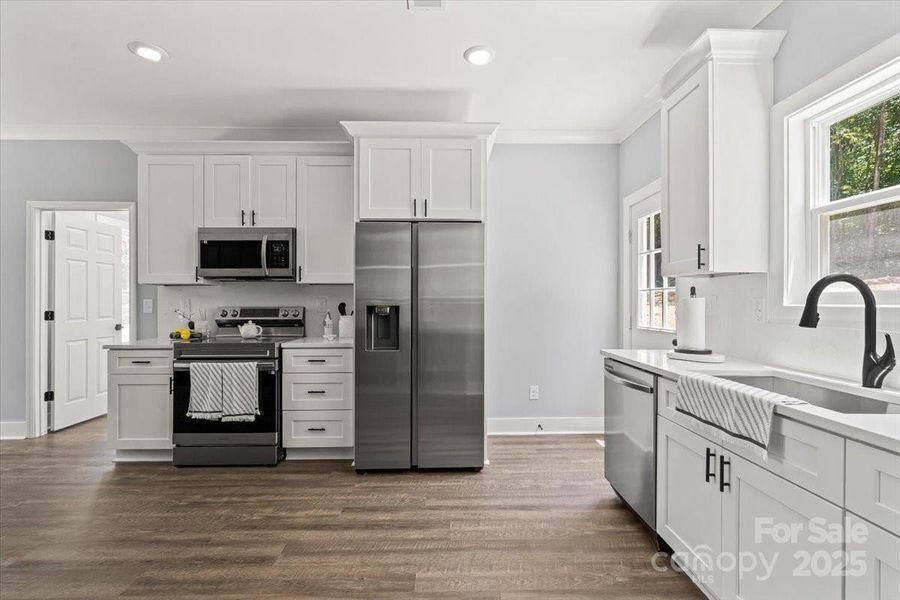 Furnished interior view inside a new home in , Albemarle (Image 10).