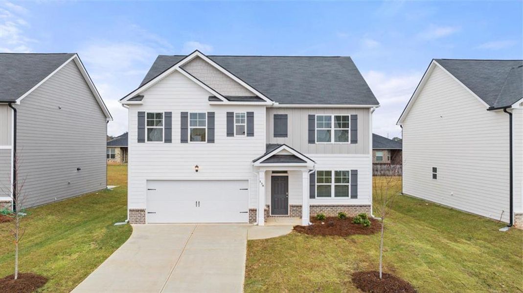 Front exterior of a new home in Champion's Run, Lithonia, GA, highlighting curb appeal (Image 1). Front exterior of a new home in Champion's Run, Lithonia, GA, highlighting curb appeal (Image 1).