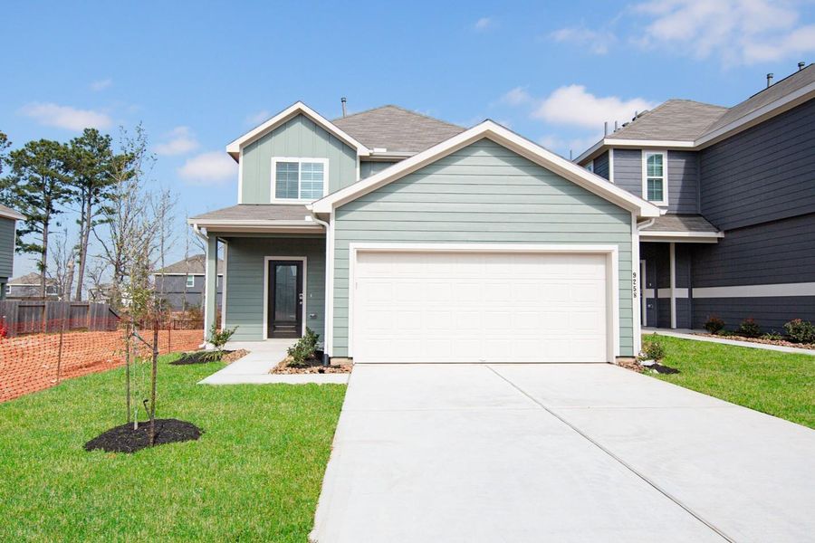 Front exterior of a new home in Ridgeland Hills, Willis, TX, highlighting curb appeal (Image 1). Front exterior of a new home in Ridgeland Hills, Willis, TX, highlighting curb appeal (Image 1).