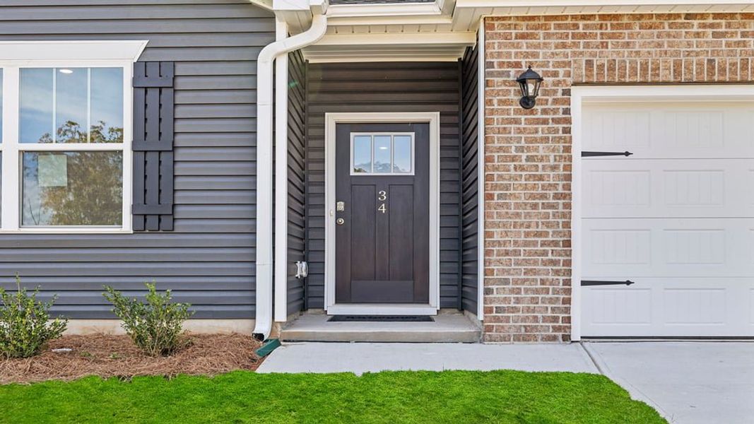 Exterior details and patio area of a home in Durbin Meadows Traditions, Fountain Inn (Image 2). Exterior details and patio area of a home in Durbin Meadows Traditions, Fountain Inn (Image 2).