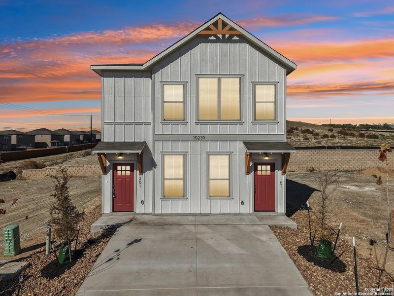 Front exterior of a new home in Magnolia Village, San Antonio, TX, highlighting curb appeal (Image 28). Front exterior of a new home in Magnolia Village, San Antonio, TX, highlighting curb appeal (Image 28).