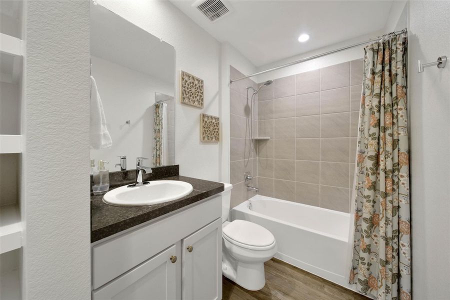 Furnished interior view inside a new home in The Canopies, Splendora (Image 18).