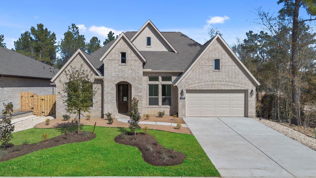 Front exterior of a new home in Colton, Montgomery, TX, highlighting curb appeal (Image 1). Front exterior of a new home in Colton, Montgomery, TX, highlighting curb appeal (Image 1).