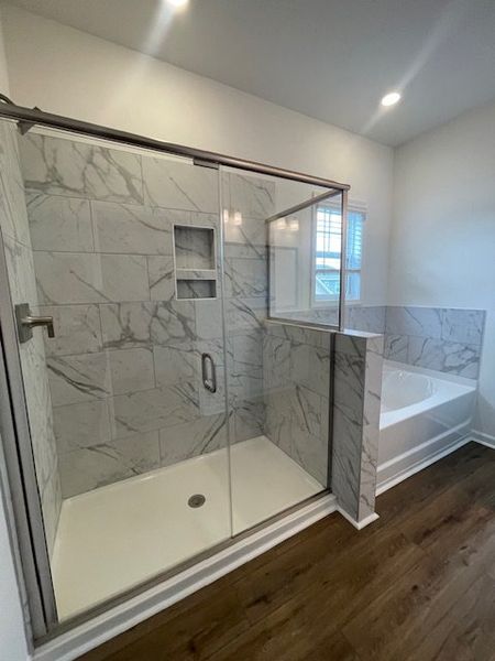 This bathroom features a contemporary shower with
