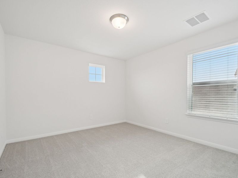 Spacious, unfurnished interior of a new home in Riverbend at Double Eagle - Boulevard Collection, Cedar Creek (Image 13).
