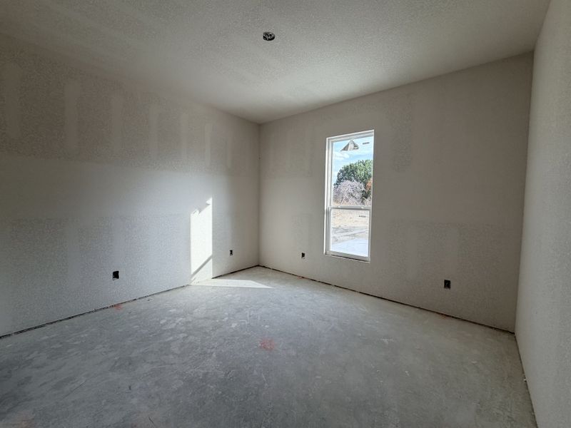 In-progress construction of a new home in Saddle Crest Estates, Weatherford, TX (Image 27).