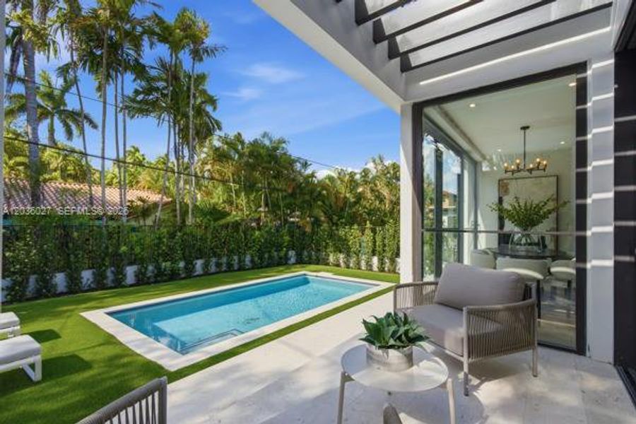 Exterior details and patio area of a home in , Coral Gables (Image 28).