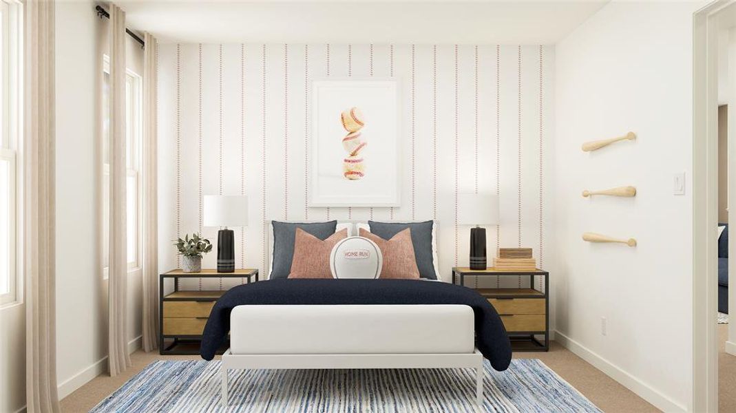 Bedroom featuring light carpet and baseboards