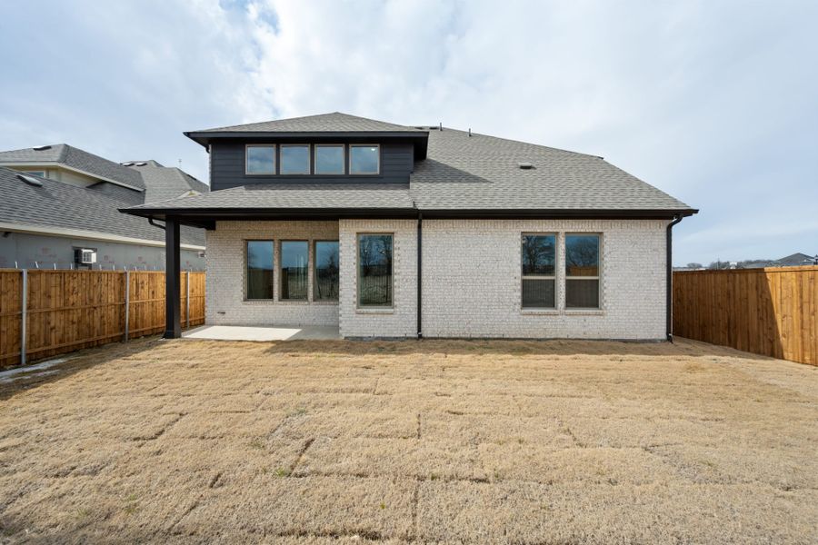 Exterior details and patio area of a home in Timberbrook, Justin (Image 2). Exterior details and patio area of a home in Timberbrook, Justin (Image 2).