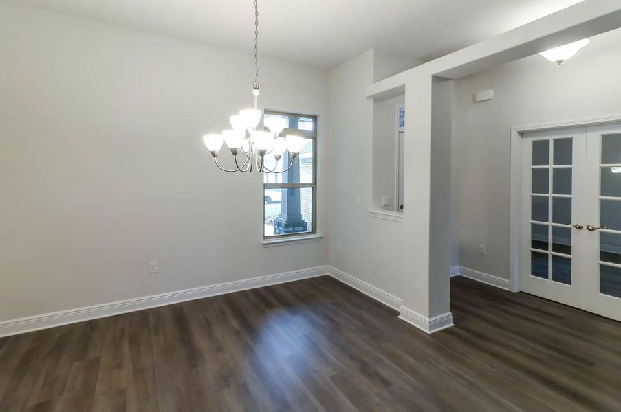 Representative unfurnished interior of a home built from the Plan 3044 by Adams Homes in Cedar Creek at Deerpoint Lake, Panama City (Image 12).