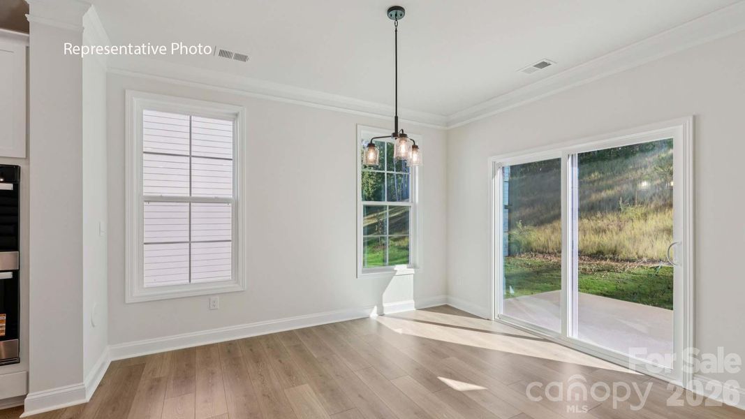 Spacious, unfurnished interior of a new home in Sanctuary at Southgate, Indian Trail (Image 21).