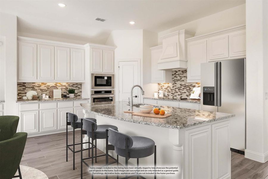 Kitchen with white cabinets, granite island with seating, tile backsplash, and stainless steel appliances Kitchen with white cabinets, granite island with seating, tile backsplash, and stainless steel appliances