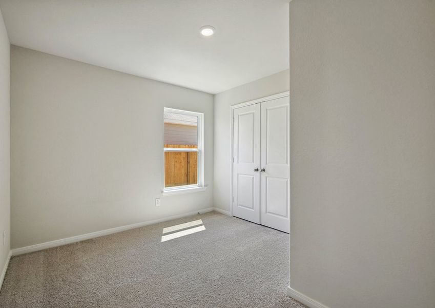 Secondary bedroom with lush carpet Secondary bedroom with lush carpet