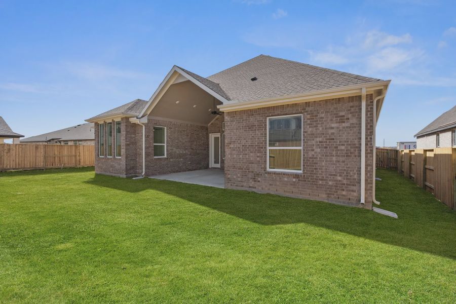 Representative exterior details of a home built from the Brentwood by Chesmar Homes in Meridiana 50's and 60's, Manvel (Image 16).