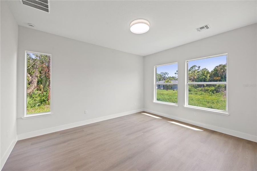 Large Primary Bedroom with huge windows Large Primary Bedroom with huge windows