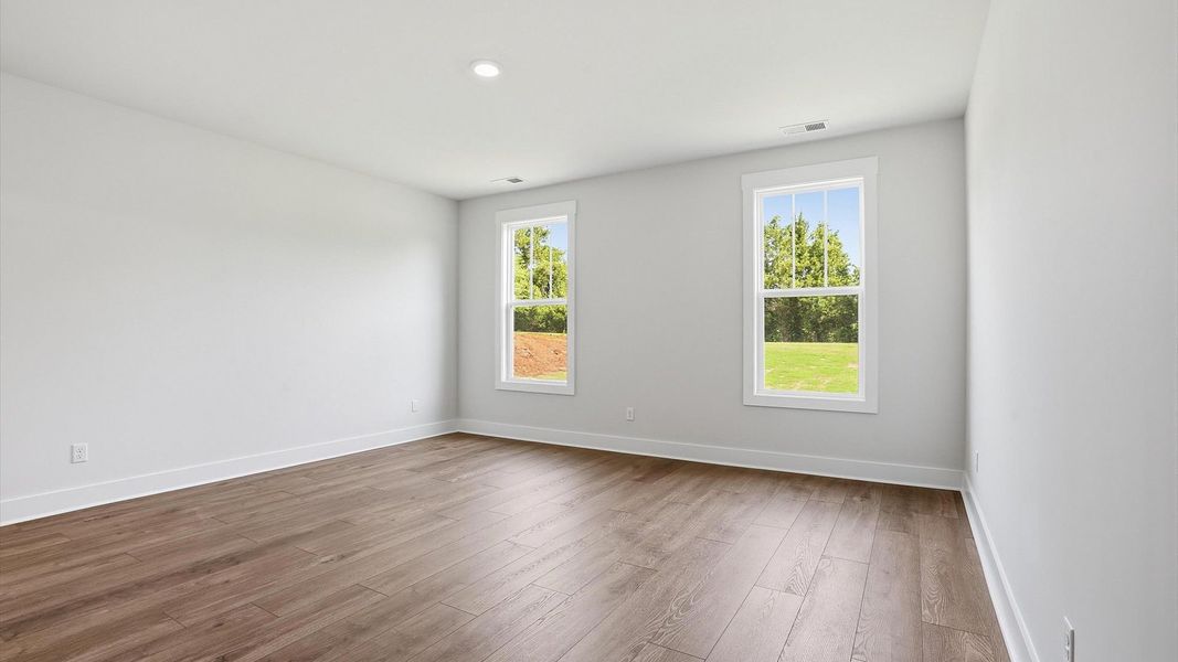 Spacious and serene primary suite with thoughtful design in a desirable DRB Homes community Spacious and serene primary suite with thoughtful design in a desirable DRB Homes community