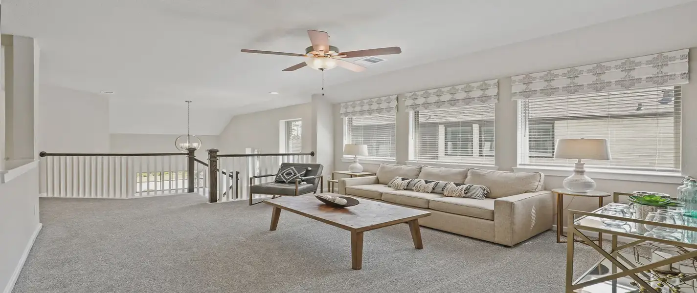 Representative furnished interior of a home built from the Durham by Chesmar Homes in The Woodlands Hills, Willis (Image 11).