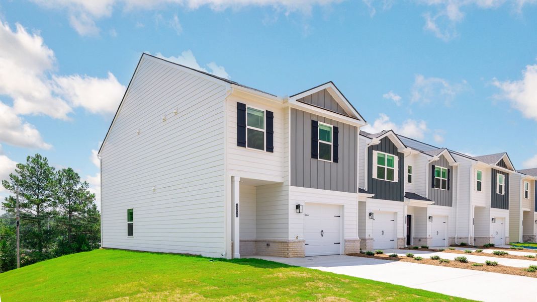 Representative exterior photo of a completed home built from the Mitchell Townhome by D.R. Horton in Belcourt Landing, Cleveland, TN (Image 2).